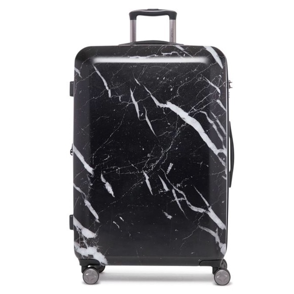 calpak black marble luggage